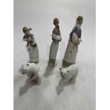 Three Lladro girl with lamb figures and two polar bears, with three boxes (5).