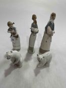 Three Lladro girl with lamb figures and two polar bears, with three boxes (5).