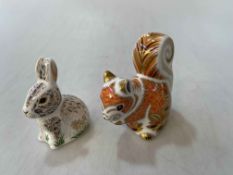 Two Royal Crown Derby paperweights, Autumn Squirrel and Nibbles, with boxes.