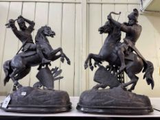 Pair of Spelter warriors on horseback, 46cm.