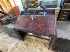 Aspreys? leather covered ledger desk, 112cm by 102cm by 56cm.