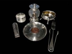 Silver items including open salt, napkin ring, tongs, fork, letter knife, pepper mill and coasters.