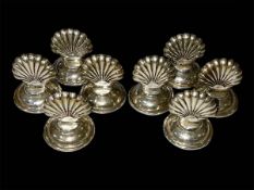Set of eight Sterling silver scallop shell place name holders.
