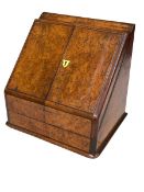 Victorian walnut slope front stationery box with fitted and perpetual calendar interior, 32cm.