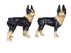 Two cast iron Boston Terrier dogs, 21cm.