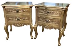 Pair gilt painted two drawer pedestals of serpentine form, 63cm by 48.5cm by 40cm.