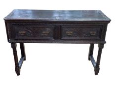Antique carved oak two drawer dresser on turned legs, 81cm by 12cm by 44cm.