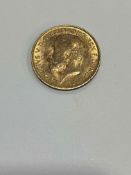 George V 1915 gold half sovereign.