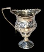 Edwardian silver embossed cream jug, Birmingham 1902, 12cm.