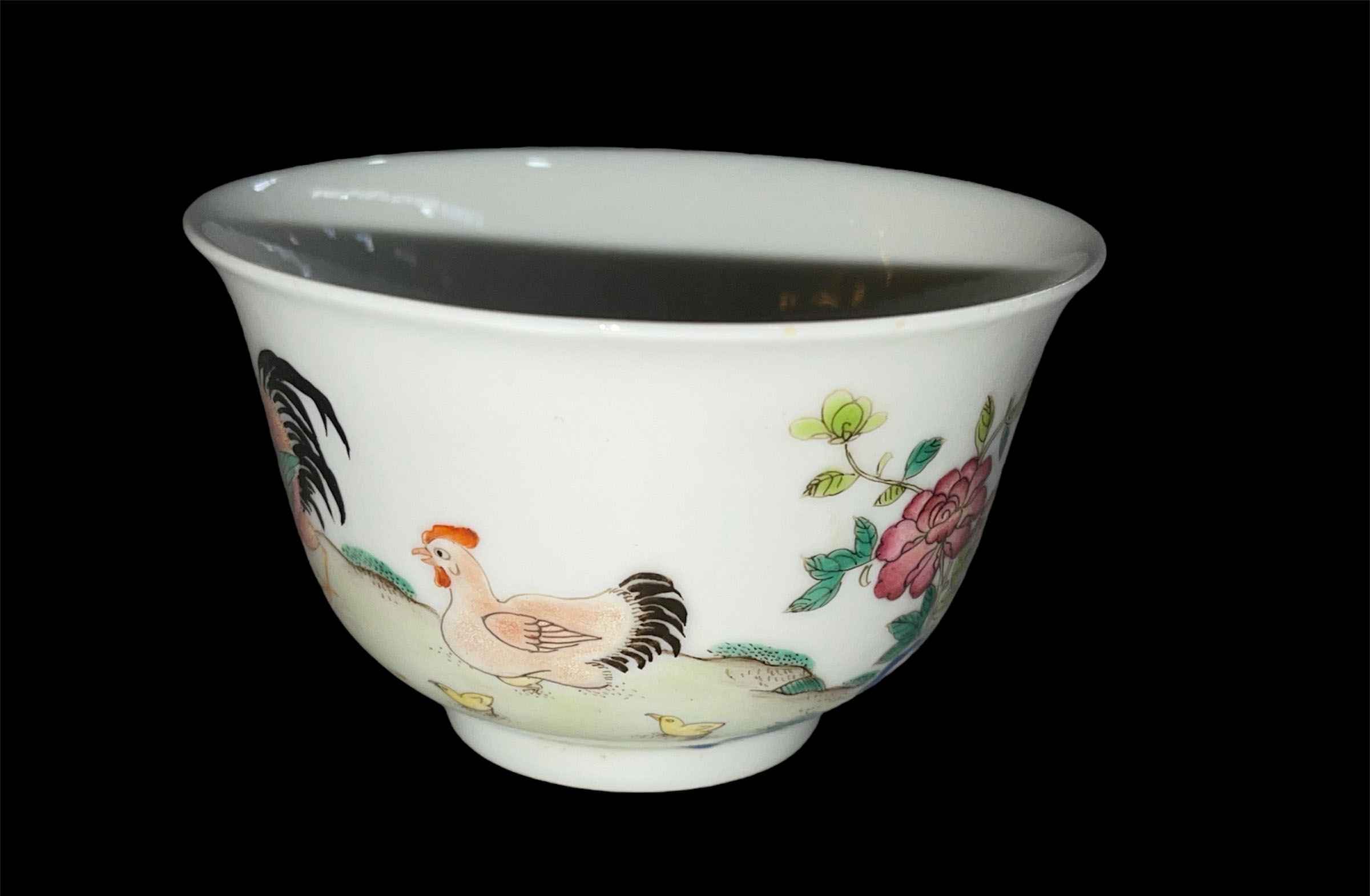 Small Chinese tea cup decorated with chickens and famille rose, 8.5cm diameter.