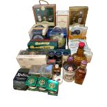 Collection of Whisky memorabilia including decanters, diecast toy cars,