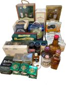 Collection of Whisky memorabilia including decanters, diecast toy cars,