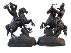 Pair of Spelter warriors on horseback, 46cm.