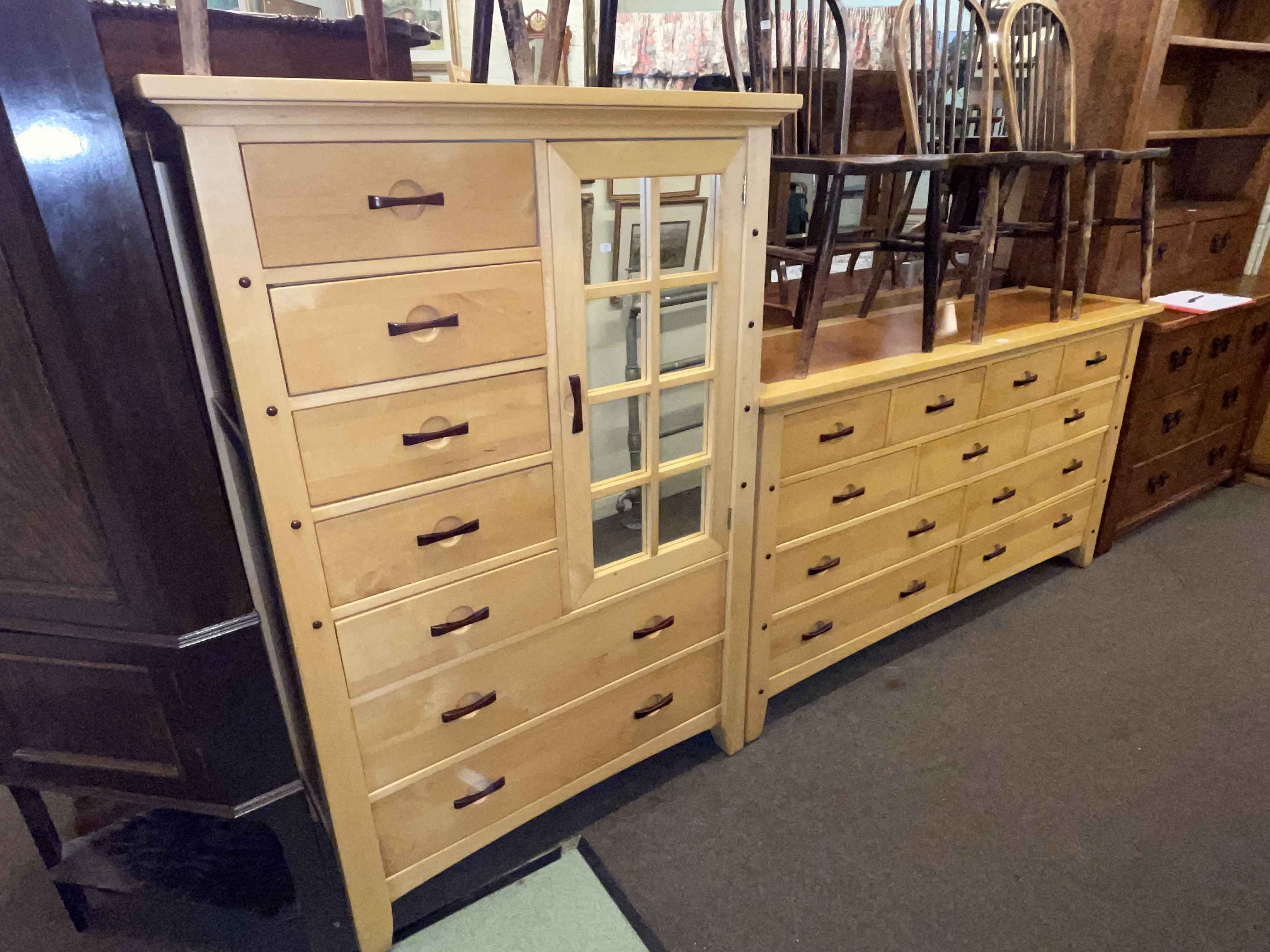 Contemporary two tone combination wardrobe and eleven drawer chest.