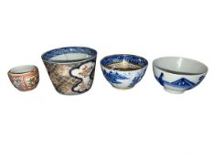 Collection of four Chinese tea bowls.