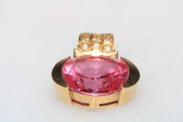 Pink stone and diamond 14kt gold pendant.