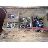 Four boxes of assorted costume jewellery, wristwatches, etc.