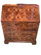 Jonathan Charles fine furniture William & Mary style walnut and oyster veneered six drawer bureau,