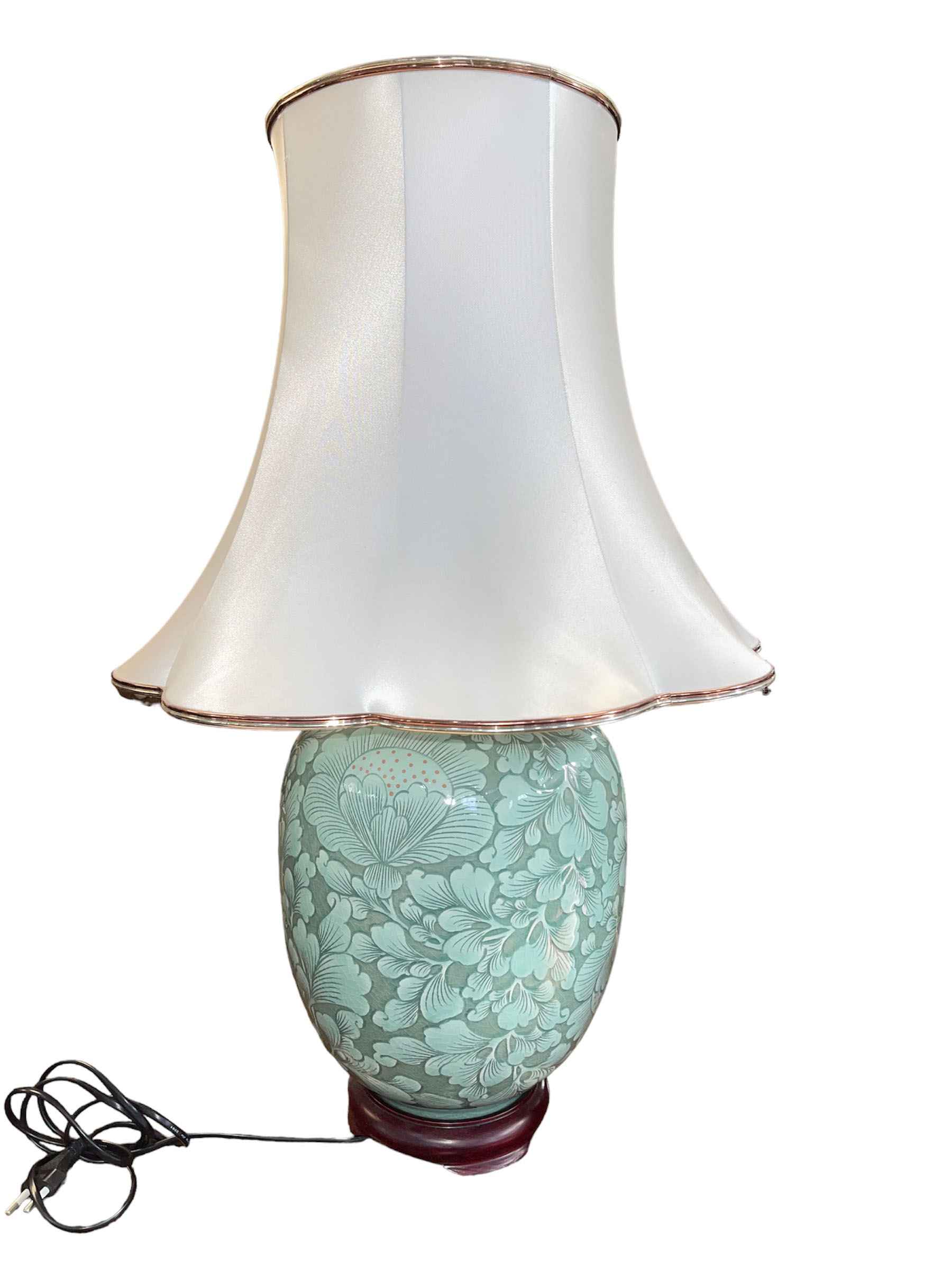 Celadon table lamp and shade, 66cm high.