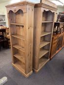 Two pine open bookcases, one with adjustable shelves (largest 183.5cm by 92cm by 33cm).