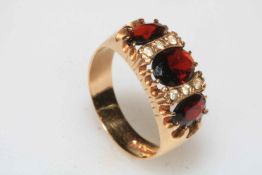 Garnet and diamond 9 carat gold ring, size R.