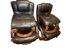 Pair brown leather reclining swivel chairs and footstools.