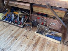 Two carpenters tool chests and a collection of carpentry tools including planes, chisels, etc.