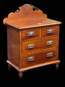 Miniature mahogany chest of two short above two long drawers, 57cm by 42cm by 26cm.