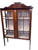 Edwardian mahogany and line inlaid two door vitrine, 183cm by 122cm by 41cm.