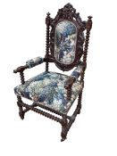 Victorian carved oak and bobbin pillar armchair in tapestry fabric.