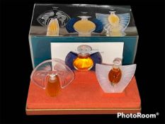 Lalique three bottle perfume set, boxed as new.