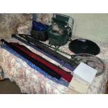 Collection of fishing equipment including rods, reels, net, seat, bags, etc.