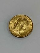 George V 1911 gold sovereign.