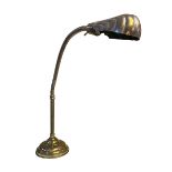 Ornate brass angle poise lamp, 58cm high.