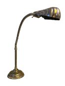 Ornate brass angle poise lamp, 58cm high.