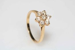 Diamond seven stone petal design 14 carat gold ring, size U.