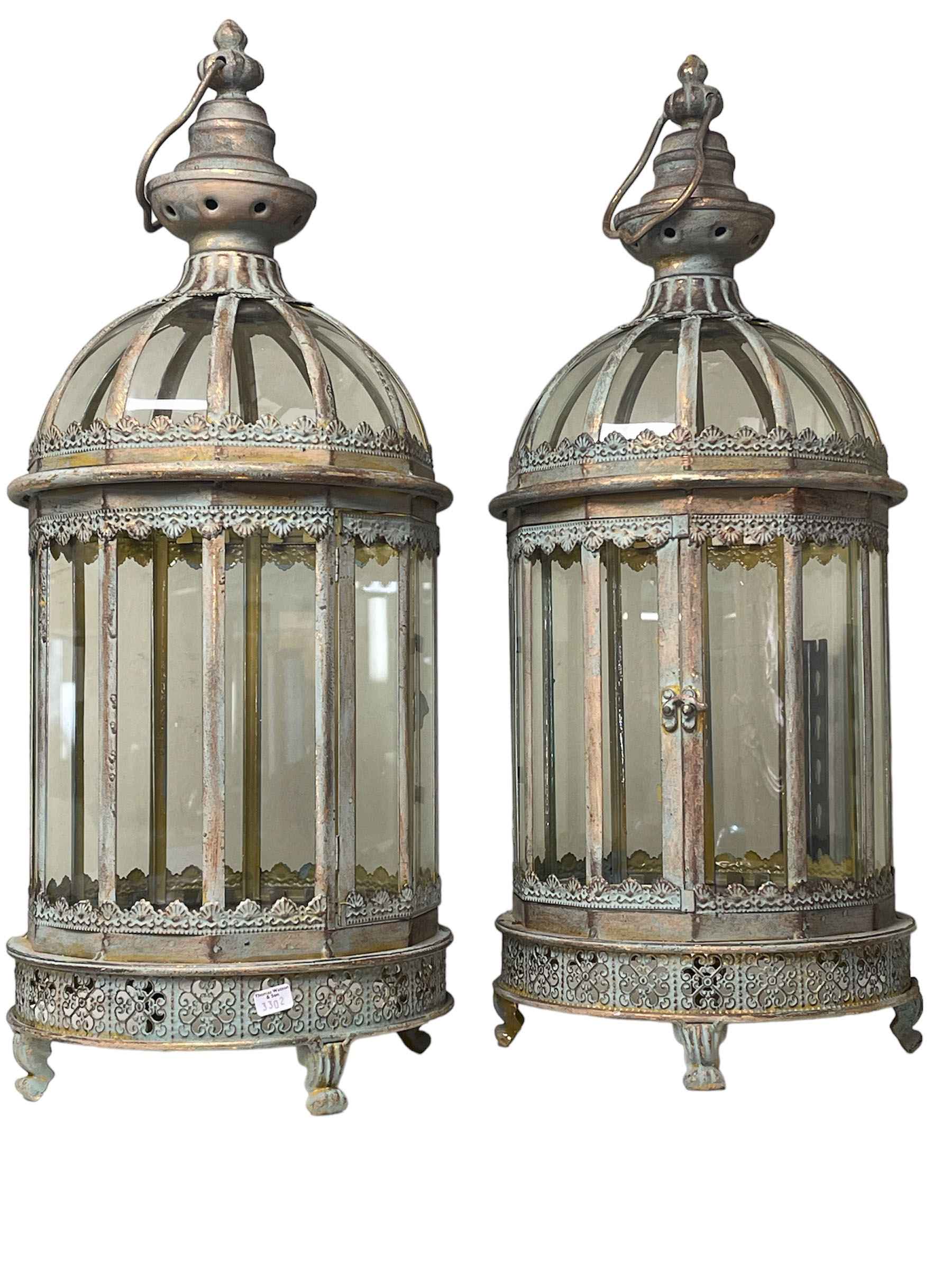 Pair of glazed panel hanging lanterns.