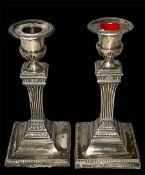 Pair late Victorian silver candlesticks with reeded columns, Sheffield 1897, 17cm.