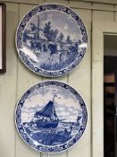 Pair of blue and white Delft wall plaques, 39.5cm diameter.