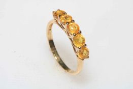 1 carat yellow sapphire and 9 carat gold ring, size P.