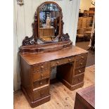 Victorian mahogany nine drawer pedestal dressing table, 160cm by 122cm by 56cm.