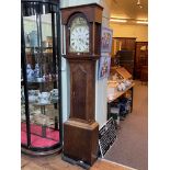 Antique oak and mahogany eight day longcase clock having painted arched dial, signed Swinburn,