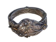 Tibetan 19th Century silver filigree bangle with opening clasp.