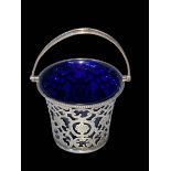 Edwardian silver pierced and engraved basket with blue glass liner, Birmingham 1907,