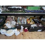 Three boxes of china and toys including figurines, Royal Doulton toby's, Binetone TV game, etc.