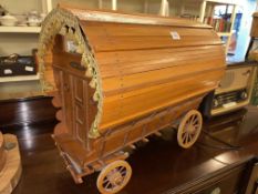 Wooden 'Romany Rose' caravan.