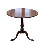 19th Century circular mahogany tripod table, 76cm by 80cm diameter.