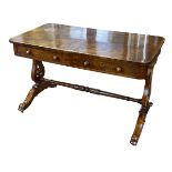 Victorian walnut two drawer library table raised on lyre ends to four scrolled legs,