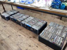 Large collection of 45rpm records in four heavy duty cases.