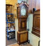 Antique mahogany and oak eight day longcase clock having painted arched dial, signed Purvis,